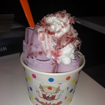 Rolled Ice Cream - Rolls and Grill - Taro rolled ice cream, topped with whipped cream and sweet shredded coconut - Desserts Near Me - Pompano Beach, Florida