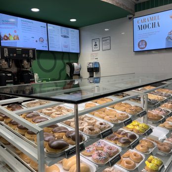 Krispy Kreme - a display case of doughnuts - Donuts Near Me - New York, New York