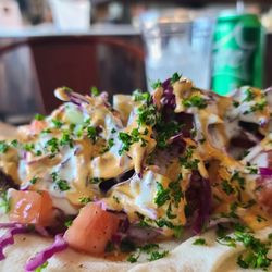 Halal Street Food - Unwrapped falafel wrap. Delicious as it looks! Add white sauce and hot sauce.