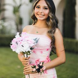 Lou Gentile's Flower Basket - The Flower Basket posse put together a beautiful corsage for my son's girl for Homecoming.