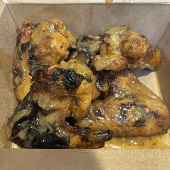 Roostr Yard - Wings with herb and lemon sauce - Salad Near Me - Oceanside, California