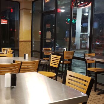 Fox Pizza & Subs II - tables and chairs in a restaurant - Pizza Near Me - Greensboro, North Carolina Fox Pizza & Subs II - tables and chairs in a restaurant - Pizza Near Me - Greensboro, North Carolina