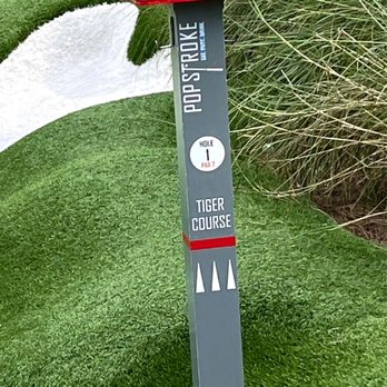 PopStroke - The 1st hole marker for The Tiger Course. - Mini Golf Near Me - Fort Myers, Florida PopStroke - The 1st hole marker for The Tiger Course. - Mini Golf Near Me - Fort Myers, Florida