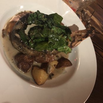 Wild Roots - Grilled Pork Chop with Chards and Roasted Potatoes. Delicious. - Breakfast & Brunch Near Me - West Allis, Wisconsin Wild Roots - Grilled Pork Chop with Chards and Roasted Potatoes. Delicious. - Breakfast & Brunch Near Me - West Allis, Wisconsin