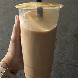 This was the house milk tea, we order with light boba-- I don't see any! No ice even after having to worker "add more" . This was the house milk tea, we order with light boba-- I don't see any! No ice even after having to worker "add more" .