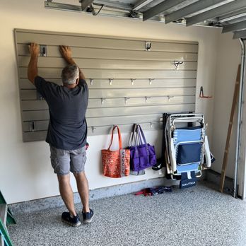 Brunswick Organizing Solutions - In this garage project, we installed a 4'x8' area of PVC slatwall and supplied the various hooks to hang items. - Home Organization Near Me - Leland, North Carolina Brunswick Organizing Solutions - In this garage project, we installed a 4'x8' area of PVC slatwall and supplied the various hooks to hang items. - Home Organization Near Me - Leland, North Carolina