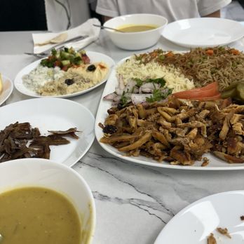 Sindbad Restaurant - A variety of their chicken swarma plate, lentil soup and side salads plate. - Middle Eastern Near Me - Glendale, Arizona Sindbad Restaurant - A variety of their chicken swarma plate, lentil soup and side salads plate. - Middle Eastern Near Me - Glendale, Arizona