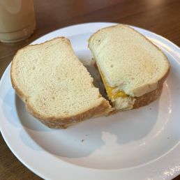 Build your own brekkie sando - egg, bacon, and cheddar on white. Build your own brekkie sando - egg, bacon, and cheddar on white.