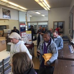 US Post Office - Line out the door with one slow employee working! Worst post office ive been to
