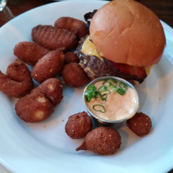 Revival - The burger, and more hush puppies that we needed right then and definitely didn't box up as leftovers later. - Southern Near Me - Minneapolis, Minnesota Revival - The burger, and more hush puppies that we needed right then and definitely didn't box up as leftovers later. - Southern Near Me - Minneapolis, Minnesota