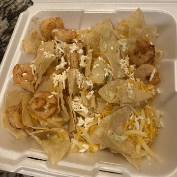 Fuzzy's Taco Shop - Look at the nachos. If you eat in store they actually drizzle it across the nachos, not here. - Tacos Near Me - Little Elm, Texas Fuzzy's Taco Shop - Look at the nachos. If you eat in store they actually drizzle it across the nachos, not here. - Tacos Near Me - Little Elm, Texas