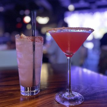 STK Steakhouse Bellevue - Burnt Pineapple Paloma (left) and Strawberry Cobbler cocktail (right) - Steakhouses Near Me - Bellevue, Washington STK Steakhouse Bellevue - Burnt Pineapple Paloma (left) and Strawberry Cobbler cocktail (right) - Steakhouses Near Me - Bellevue, Washington