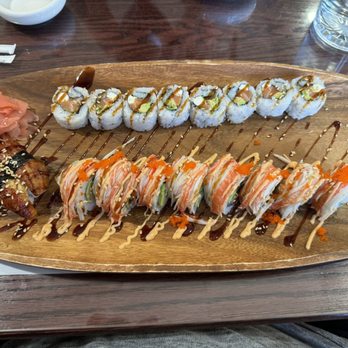Bento Sushi - Left: unagi; top: Philly roll; bottom: yellow tiger roll. - Sushi Bars Near Me - Albuquerque, New Mexico