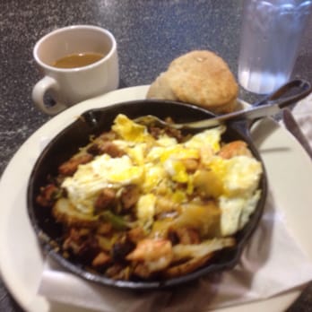 Thumbs Up Diner - Low Country Heap - skillet of spuds, spicy shrimp, chx sausage sautéed w/ garlic, onions, green pepper and covered with 2 eggs - American Near Me - East Point, Georgia Thumbs Up Diner - Low Country Heap - skillet of spuds, spicy shrimp, chx sausage sautéed w/ garlic, onions, green pepper and covered with 2 eggs - American Near Me - East Point, Georgia
