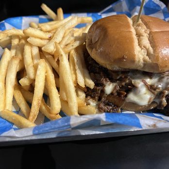 Spectators SBG - Brisket sandwich and thin fries - Sports Bars Near Me - Altoona, Iowa Spectators SBG - Brisket sandwich and thin fries - Sports Bars Near Me - Altoona, Iowa