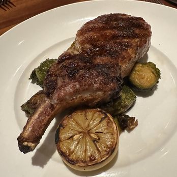 Seasons 52 - Wood-Grilled Dry-Rubbed Pork Chop - New American Near Me - Plano, Texas Seasons 52 - Wood-Grilled Dry-Rubbed Pork Chop - New American Near Me - Plano, Texas