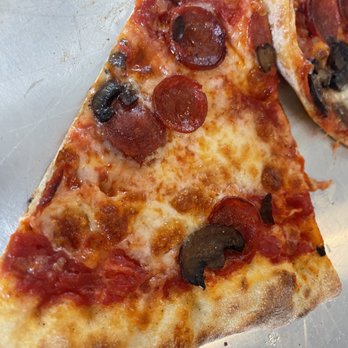 Pizzeria Ruby - Pepperoni and mushroom - Italian Near Me - Springdale, Arkansas Pizzeria Ruby - Pepperoni and mushroom - Italian Near Me - Springdale, Arkansas