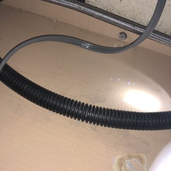 CalPro Inspection Group - Wall2Wall denied water leak happened when they performed inspection. Lifting the hose proved there's water there. - Home Inspectors Near Me - Campbell, California