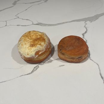 Dough - Astoria - Cheesecake with graham cracker (left), nutella stuffed (right) - Donuts Near Me - Astoria, New York