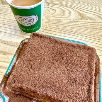 HK Cafe - HK Cafe Special Ovaltine Toast w tea forward, lightly sweetened warm milk tea. A sweet delight. - Hong Kong Style Cafe Near Me - Honolulu, Hawaii