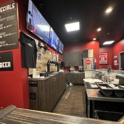 Wicked Chicken - Santa Clarita - Inside. 3 TVs above the bar.