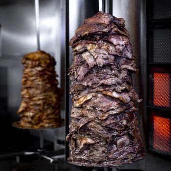 Kostas Meat Market - Pork Gyros (foreground) and Chicken Gyros (background) - Meat Shops Near Me - Pickering, Ontario Kostas Meat Market - Pork Gyros (foreground) and Chicken Gyros (background) - Meat Shops Near Me - Pickering, Ontario