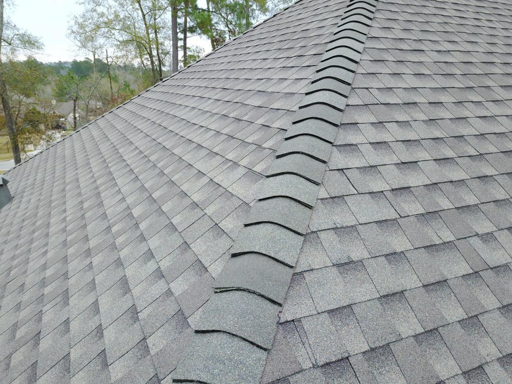 Slide of EG Roofing