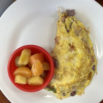 Hi Tulip Cafe - Western omelette minus cheese and mushrooms. Inside a fruit very good - American Near Me - Flagler Beach, Florida Hi Tulip Cafe - Western omelette minus cheese and mushrooms. Inside a fruit very good - American Near Me - Flagler Beach, Florida