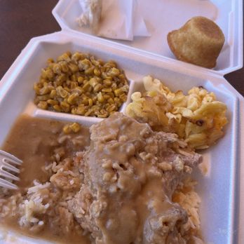 Mrs B’s Home Cooking - Smothered pork chops over rice, mac and cheese, corn, and cornbread - Soul Food Near Me - Montgomery, Alabama Mrs B’s Home Cooking - Smothered pork chops over rice, mac and cheese, corn, and cornbread - Soul Food Near Me - Montgomery, Alabama