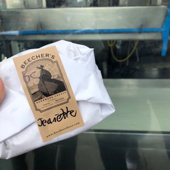 Beecher's Handmade Cheese - Having a sandwich while watching the cheese being made. - Cheese Shops Near Me - Seattle, Washington