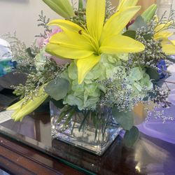 Flowers By Francis - I asked for a tall lobby arrangement, tropical inspired. I got this instead. Low, compact, with mostly filler flowers. Not worth $80.