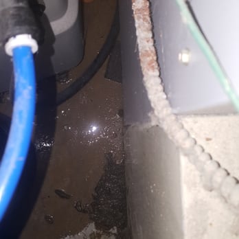 Osby Water Conditioning - Again, standing water left by tech between the water softner and our furnace. - Water Purification Services Near Me - Hebron, Indiana