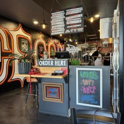 Slice Godz Pizzeria - Decor and menu