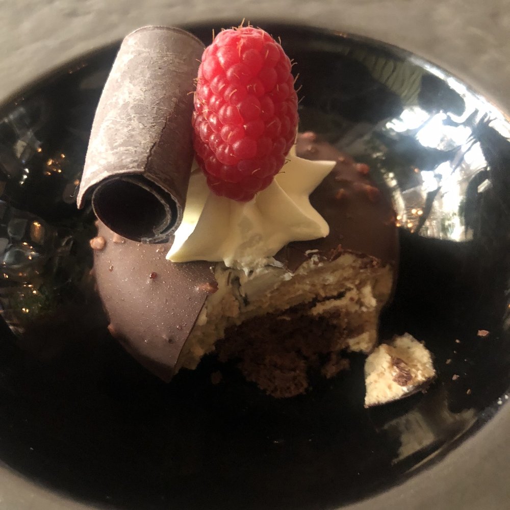 Orchard - Chocolate rocher cake - can't go wrong with chocolate, hazelnut and cream! - Mediterranean Near Me - Calgary, Alberta Orchard - Chocolate rocher cake - can't go wrong with chocolate, hazelnut and cream! - Mediterranean Near Me - Calgary, Alberta