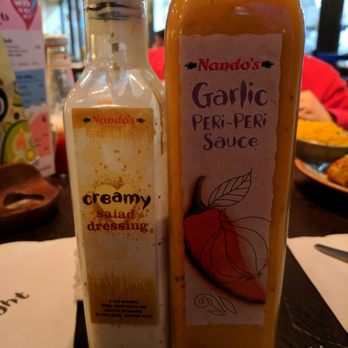 Nando's - Lots of dressings on the side, I selected the Garlic Peri-Peri and Creamy Ranch. - Fast Food Near Me - Belfast, BFS