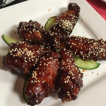 Sizzling Kitchen - Honey sriracha wings - Italian Near Me - Lowell, Massachusetts Sizzling Kitchen - Honey sriracha wings - Italian Near Me - Lowell, Massachusetts