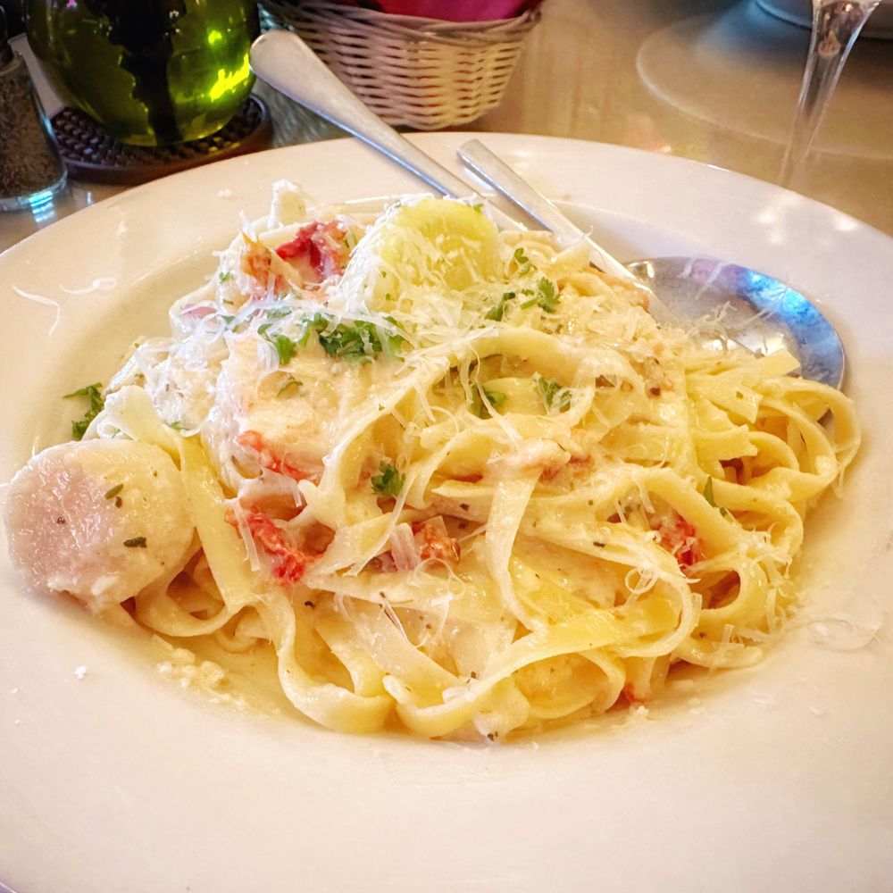Italian Kitchen - Seafood Fettuccine with prawns, scallops, mussels, sun-dried, tomatoes, and salmon - Italian Near Me - Spokane, Washington Italian Kitchen - Seafood Fettuccine with prawns, scallops, mussels, sun-dried, tomatoes, and salmon - Italian Near Me - Spokane, Washington
