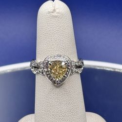 Diamond Brokers - Fancy Yellow heart shape halo diamond ring.