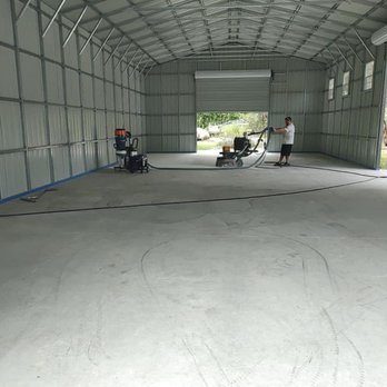 Rad Epoxy Systems - a man working in a garage - Flooring Near Me