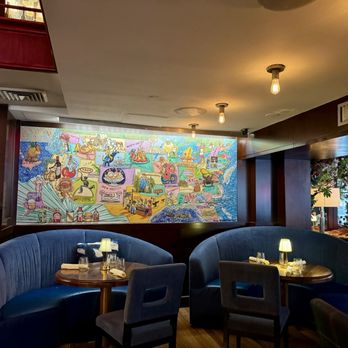 Redeye Grill - a restaurant with a colorful mural on the wall - New American Near Me - New York, New York Redeye Grill - a restaurant with a colorful mural on the wall - New American Near Me - New York, New York