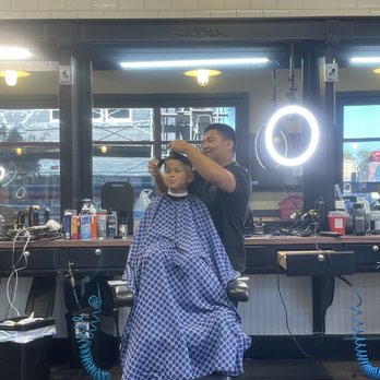 Moose's Barber Shop and Shave - My son enjoying his conversation with Jordi - Barbers Near Me - Chula Vista, California Moose's Barber Shop and Shave - My son enjoying his conversation with Jordi - Barbers Near Me - Chula Vista, California