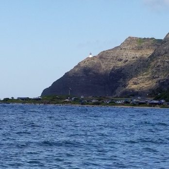 Makai Research Pier - Makapu'u Lighthouse (white) in the distance - Beaches Near Me - Waimanalo, Hawaii Makai Research Pier - Makapu'u Lighthouse (white) in the distance - Beaches Near Me - Waimanalo, Hawaii