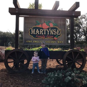 MARTYNSE FAMILY FARM - a family standing in front of a sign - Farmers Market Near Me - Penryn, California MARTYNSE FAMILY FARM - a family standing in front of a sign - Farmers Market Near Me - Penryn, California