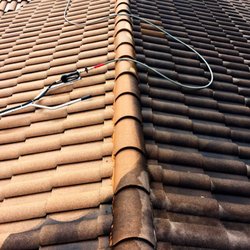 Top Dog Pressure Cleaning & Sealing Service - Partial roof cleaned. No chemicals for this client.