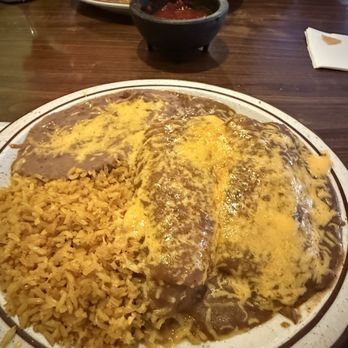 Casa Munoz - 3 item combo. Chili verde enchilada, Shredded beef enchilada, and a beef taco, which I already ate. Lol - Mexican Near Me - Bakersfield, California