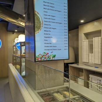 Pie Central Bakery - a menu on the wall - Lebanese Near Me - Ottawa, Ontario