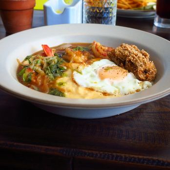 Neptune's - Cheesy shrimp and grits with a deep fried oyster - New American Near Me - Alameda, California Neptune's - Cheesy shrimp and grits with a deep fried oyster - New American Near Me - Alameda, California