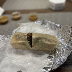 Tacos Locos - Steak burrito, comes with beans lettuce, tomato