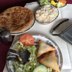 Newmarket Indian Cuisine - Rice, paratha and samosas
