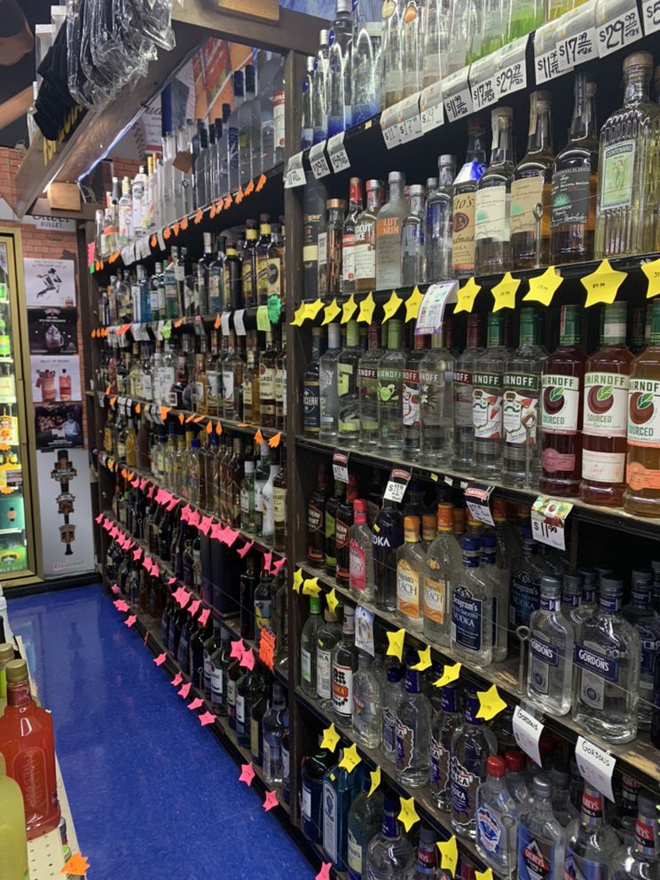 Woodside Manor Liquor Logo